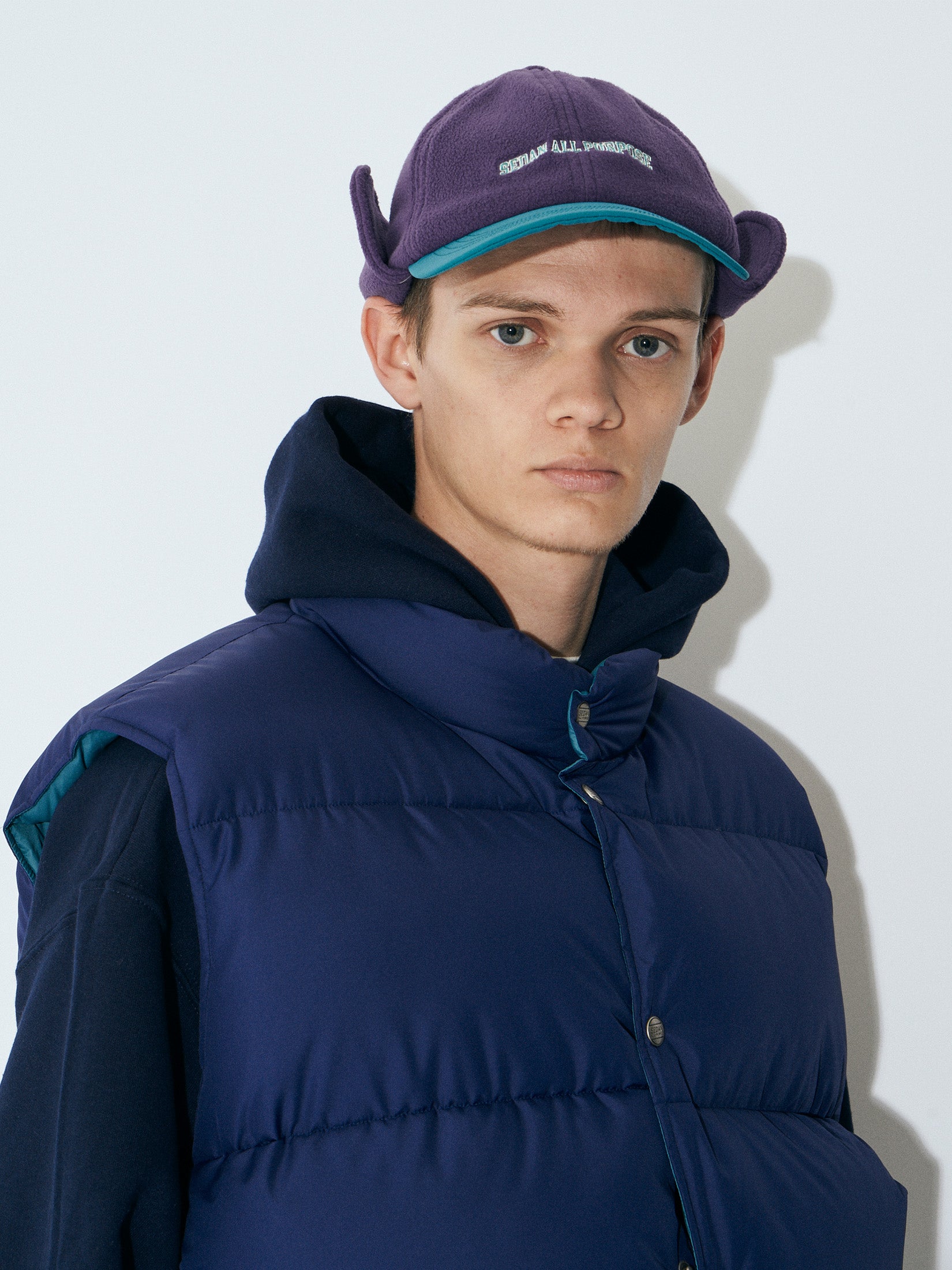 ARCH LOGO EAR FLAP FLEECE CAP｜PURPLE x TEAL