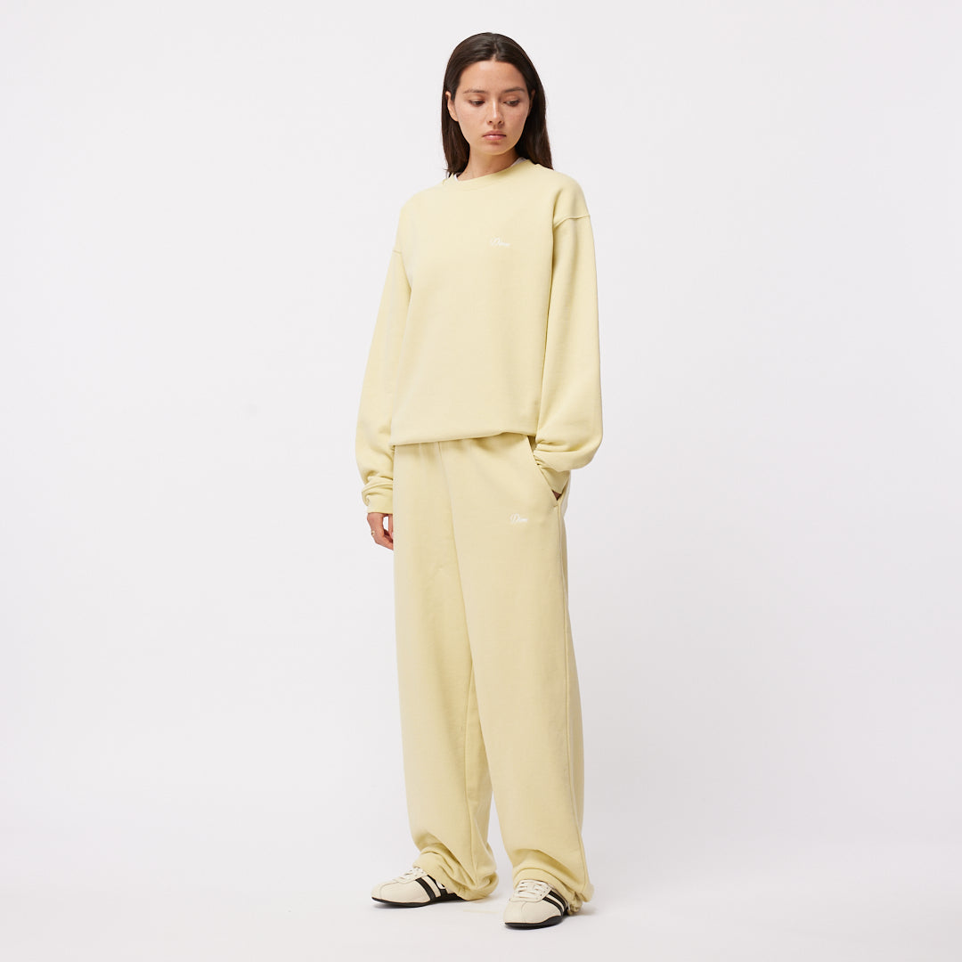 CURSIVE SMALL LOGO CREWNECK｜CLOUD CREAM